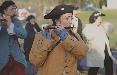 The Sudbury Ancient Fyfe and Drum Companie marches from Sudbury Town Hall to Concord