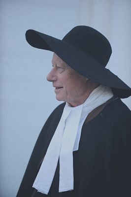 Tony Howes, portraying a minister, prepares the Sudbury Companies for battle before their march from Sudbury Town Hall to Concord